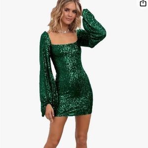sparkle green homecoming mini dress. Long sleeved with tie in the back.